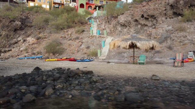 Colorful vacation homes on coastline in Mexico 