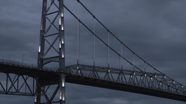 Florianopolis, close-up night view of the Herc&iacute;lio Luz suspension bridge. Detail of the metal structure.