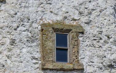 A vintage window in the old lighthouse building