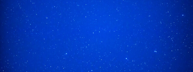 Night sky with many stars, panorama blue milky way night sky background © Pavlo Vakhrushev