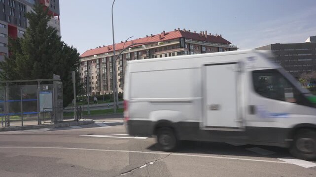 City traffic flowing through an urban intersection