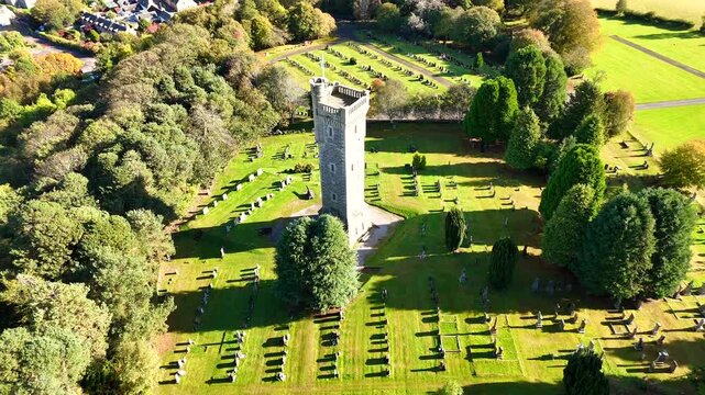 Epic Cinematic Drone Flight Above Macdonald Memorial Tower and Dingwall Town in the Scottish Highlands, Scotland &ndash; Historic Stone Landmark Rising Over Scenic Highland Landscape
