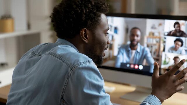 Diverse employees engaging in an active video conference call while discussing project updates and collaborating effectively from different locations