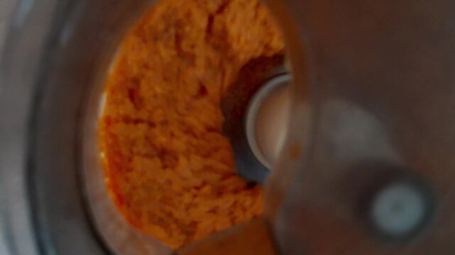 making red lentil patties with green peas in a food processor