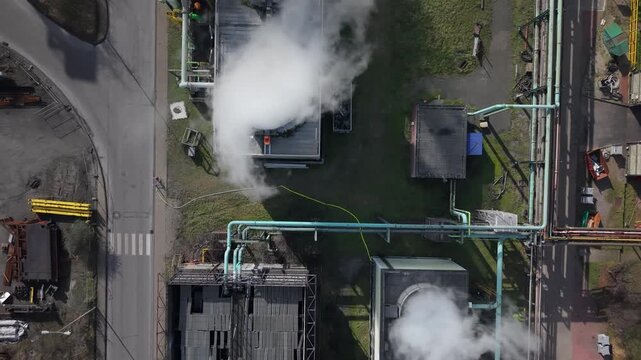 Aerial Top-Down View of Industrial Cooling Towers Emitting Steam at a Factory in Germany, Ruhr Area 