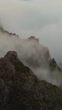 Panoramic mountain landscape above clouds during sunrise, 60fps Apple Log 2