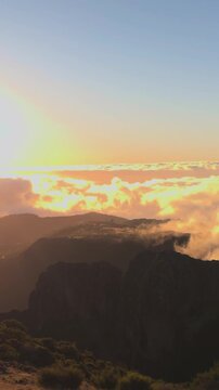 Atmospheric mountain peak with rolling fog and hikers at sunrise, high altitude 1818m, Apple Log 2