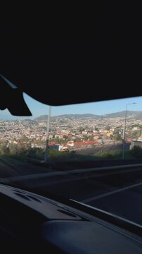 Vertical 4K car POV driving into Funchal city, Madeira, Portugal