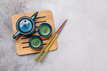 Asian tea ceremony set with teapot and cups