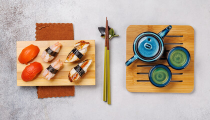 Sushi set with tea and small teapot © evgeeenius