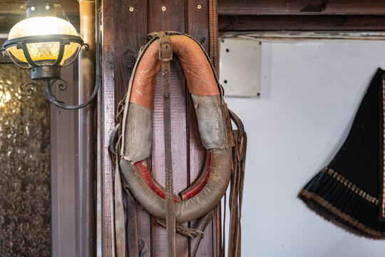 Vintage Horse Collar Hanging on Wooden Wall in Bulgaria