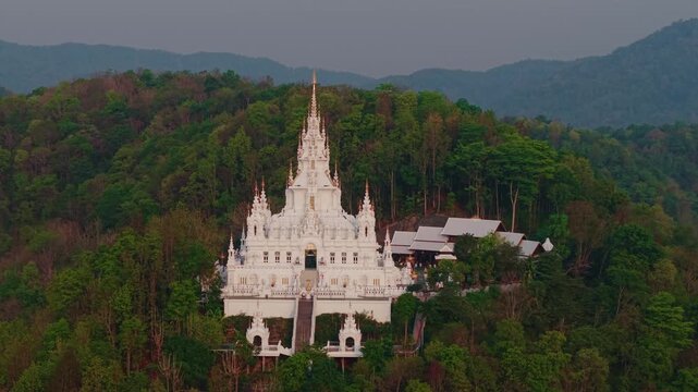 Aerial view White pagoda Loha Prasat Sri Mueang Pong temple in Chiang Mai, Thailand.