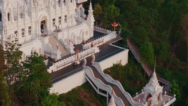 Aerial view White pagoda Loha Prasat Sri Mueang Pong temple in Chiang Mai, Thailand.