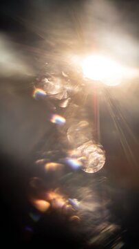 Light leaks Lens flare holographic effect vertical background. Texture of retro film overly, image with scratch, dust and lights