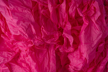 Fototapeta premium Pink latex sterile medical gloves as a background.