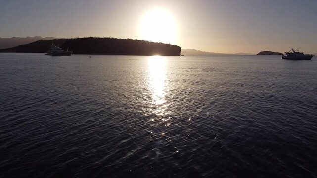 Ocean island sunrise drone 