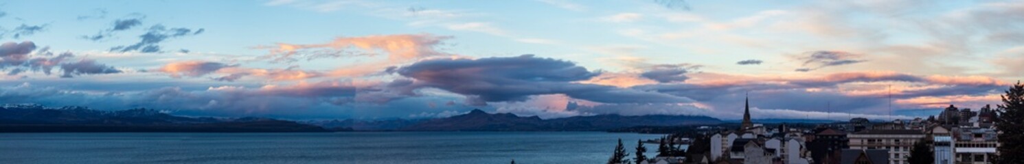 panorama of the city  Bariloche's main square, with Alpine-inspired architecture and the cathedral tower in the background. San Carlos de Bariloche, Patagonia, Argentina. Andes Mountains