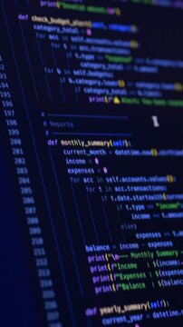 Source code displayed on monitor during vibe coding supported by ai assistant. Programming scene highlights artificial intelligence integration and structured software architecture workflow.