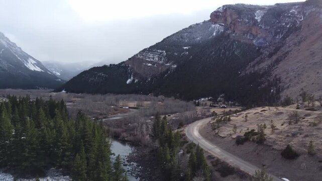 Mountain river and road foggy