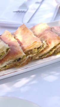 National dish popular in the Balkans Byrek with spinach. traditional Albanian food Agro tourism.