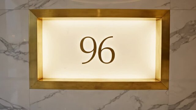 Marble Wall Lightbox \'96 luxury illuminated brand signage mockup, a refined interior scene featuring a polished white marble wall with delicate grey veining, a recessed rectangular lightbox