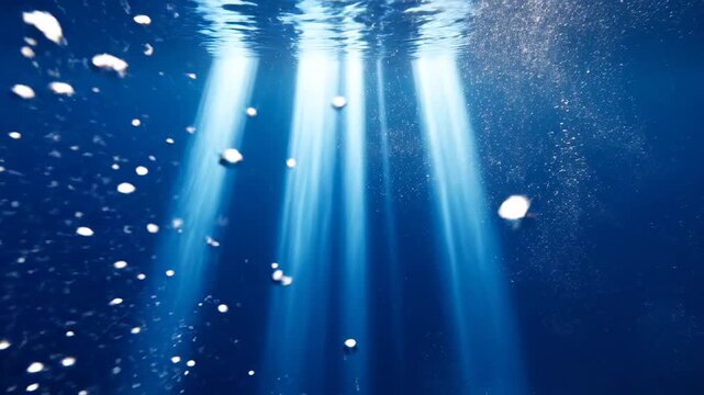 Video of Abstract Blue Underwater Light Beams, luminous marine depth background, aquatic clarity concept for digital and environmental storytelling.