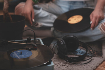 girl listening to vinyl records
