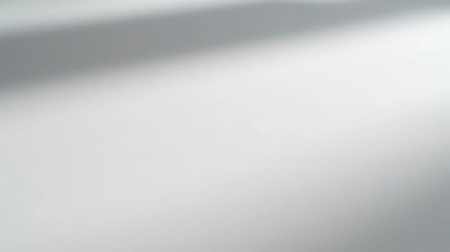 Video of Minimal White Paper Texture Background, smooth document sheet close view, neutral printable surface concept for design and advertising media.