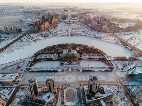 Aerial drone view Nur-Sultan, Kazakhstan Qazaqstan city center with skyscrapers and Baiterek Tower.
