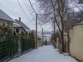 Quiet Snow Covered Residential Street - Winter Landscape with Houses