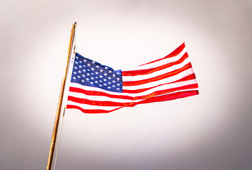Obraz premium american flag blowing in the wind