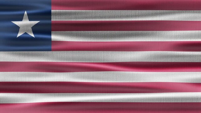 Liberia flag waving in the wind with high quality fabric texture