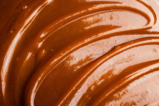Close-up of smooth salted caramel swirl texture