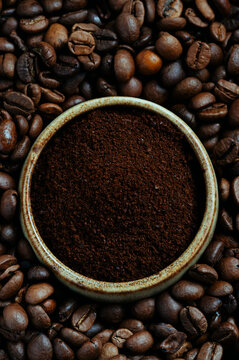 Aromatic coffee beans with rich dark ground coffee