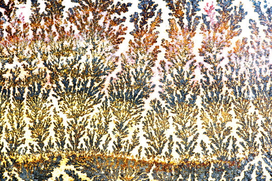 Pyrolusite mineral pattern creating intricate designs