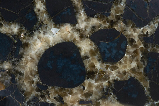 Calcite crystal stone texture with dark mineral pattern