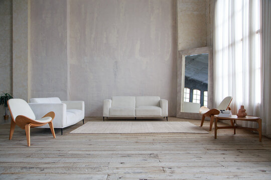Wide angle of a minimalist loft living room with white sofas and designer wooden furniture