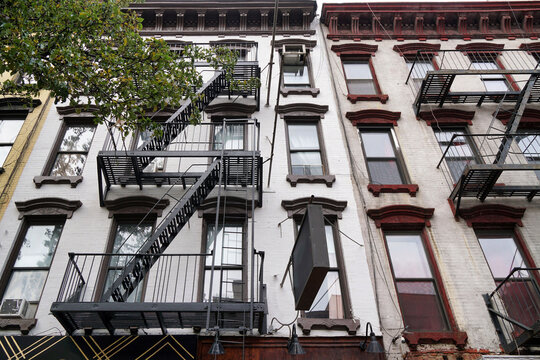 old low rise New York City apartment buildings with external fire escape