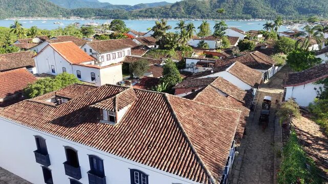 Aerial view of Paraty colonial town with tropical ocean and mountains Brazil
