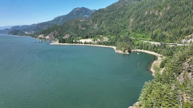 Drone Revealing Hidden Cove Along Sea to Sky Highway, Howe Sound British Columbia Canada