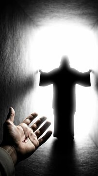 Resurrection of Jesus Christ showing stigmata hand reaching for light in dark tomb