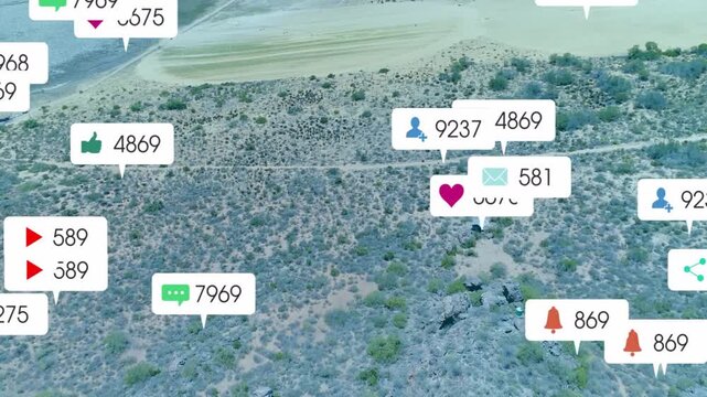 Camera pulling back and panning, badges appearing and clustering over scrubland, showing engagement