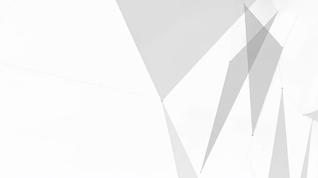 Light gray triangles connected by points against a bright white background