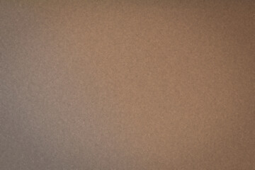 Fototapeta premium Muted brown horizontal gradient filled with fine noise grain, offering a warm understated backdrop ideal for typography, product mockups, headers, and web design.