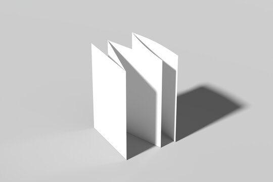 Realistic accordion-fold brochure standing upright with strong directional lighting casting bold shadows. Clean and modern presentation perfect for travel brochures, corporate profiles, product guides