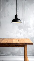Obraz premium Simple photo of a wood table and overhead light against an abstract gray wall in a minimalist, interior setting