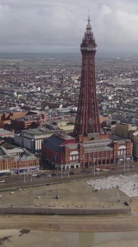 Vertical establishing aerial view of Blackpool, seaside town in Lancashire, England, United Kingdom.