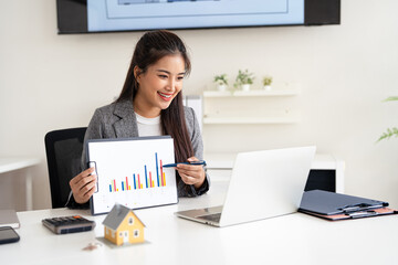 Young asian woman real estate advisor talking with client online about monthly mortgage payment,...