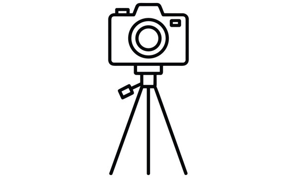 Camera mounted on a tripod for stable photography and videography applications with a flash attachment