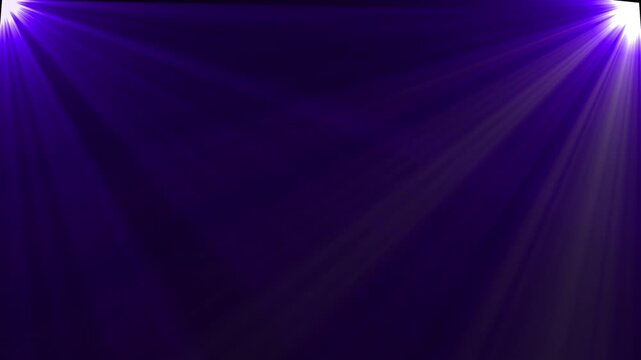 Purple stage spotlights shining from corners on dark background with video animation.